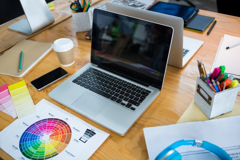laptop-color-swatch-and-mobile-phone-on-desk-in-c-2025-10-28-21-51-15-utc